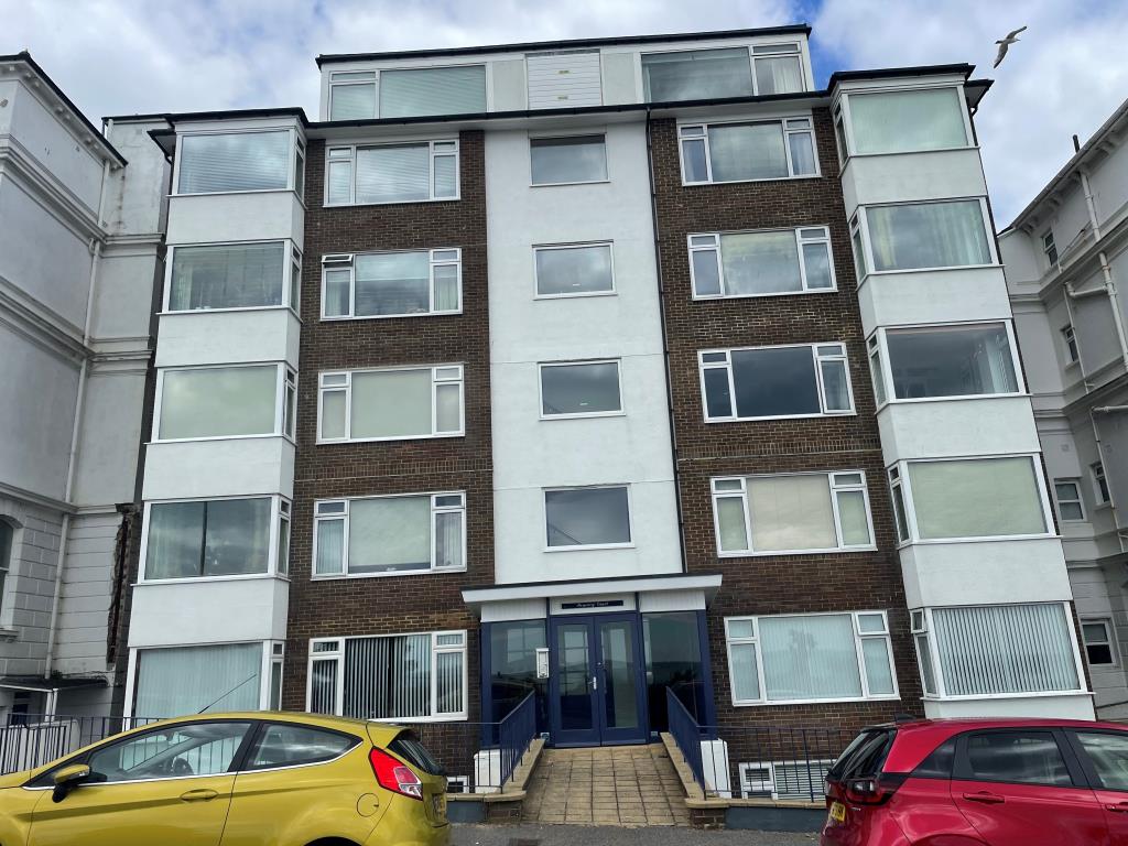 Lot: 156 - TWO-BEDROOM FLAT WITH SEA VIEWS - View of front of building from seafront